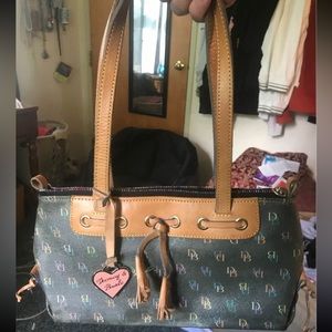 DOONEY AND BOURKE rainbow pattern tassel zip top purse! Gently used.